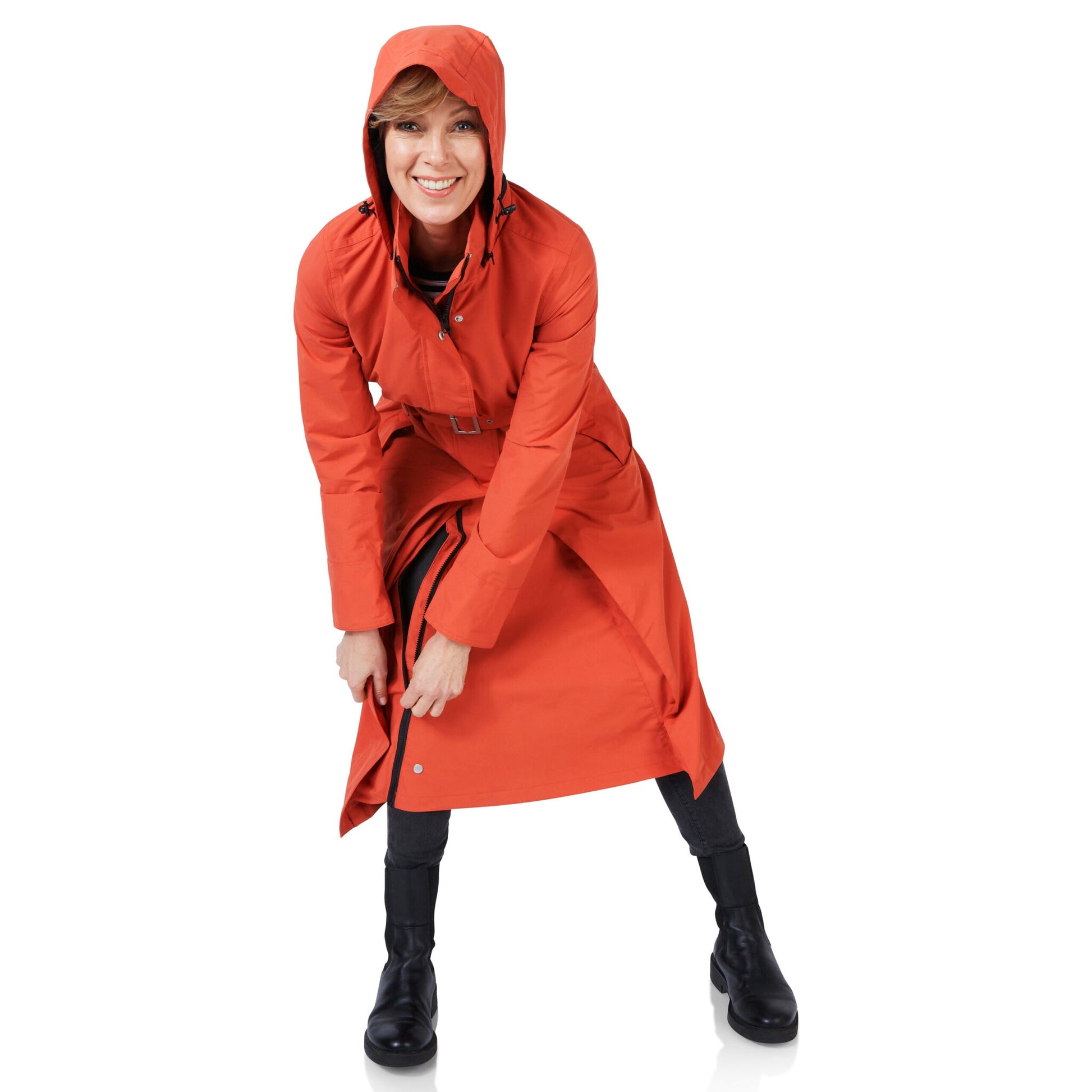 Person wearing a red raincoat on a white background