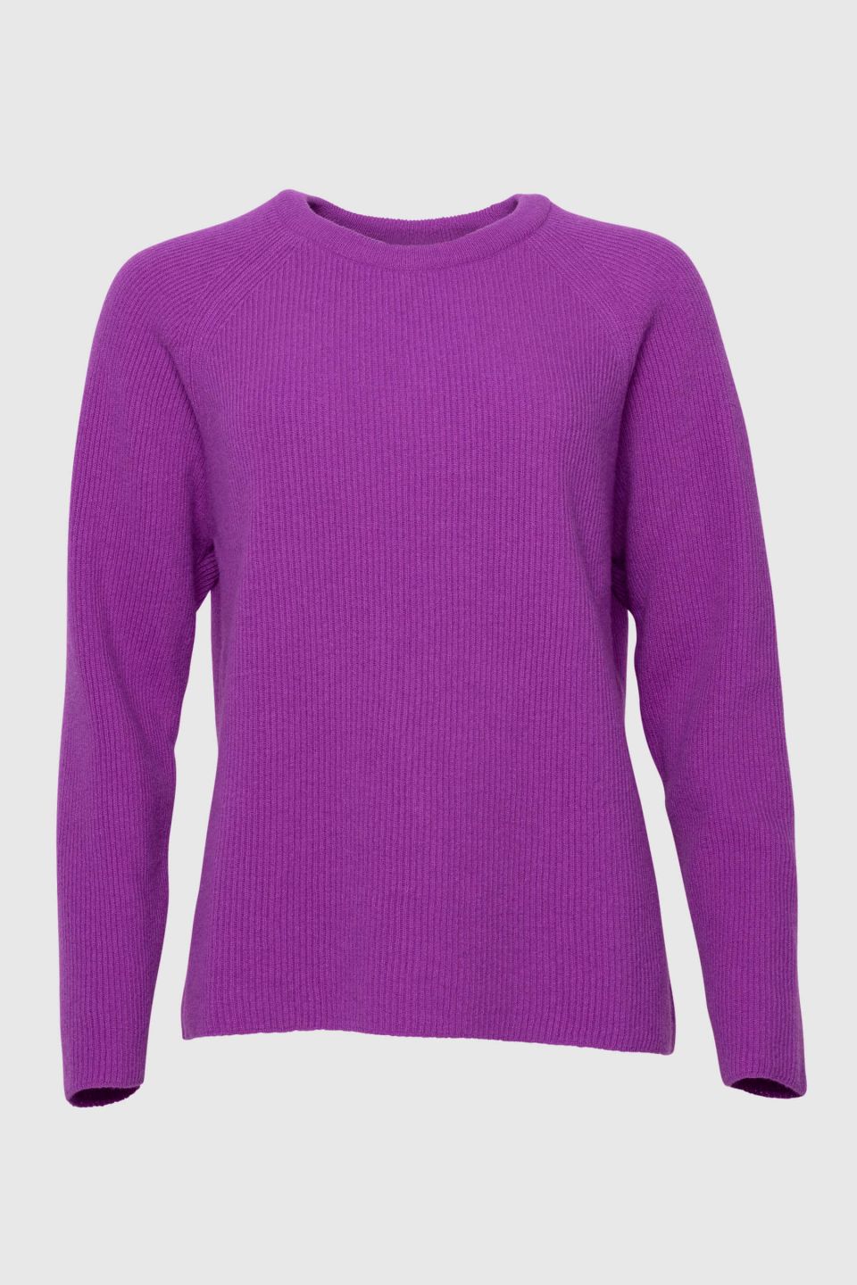 Purple sweater on a light gray background