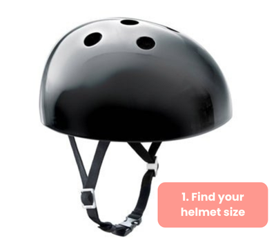 Black helmet with chin strap on a white background